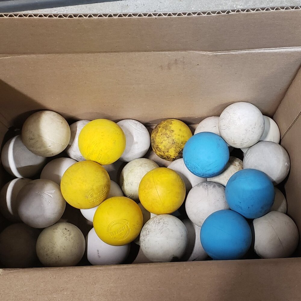 34 USED LACROSSE BALLS